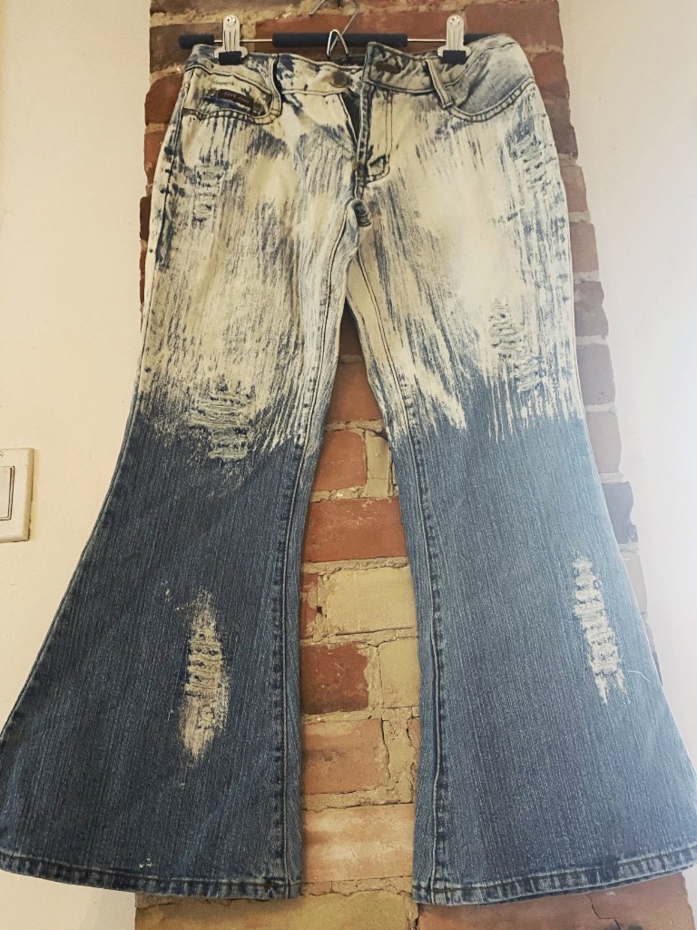 Dove bleached and textured bell bottom jeans size 28